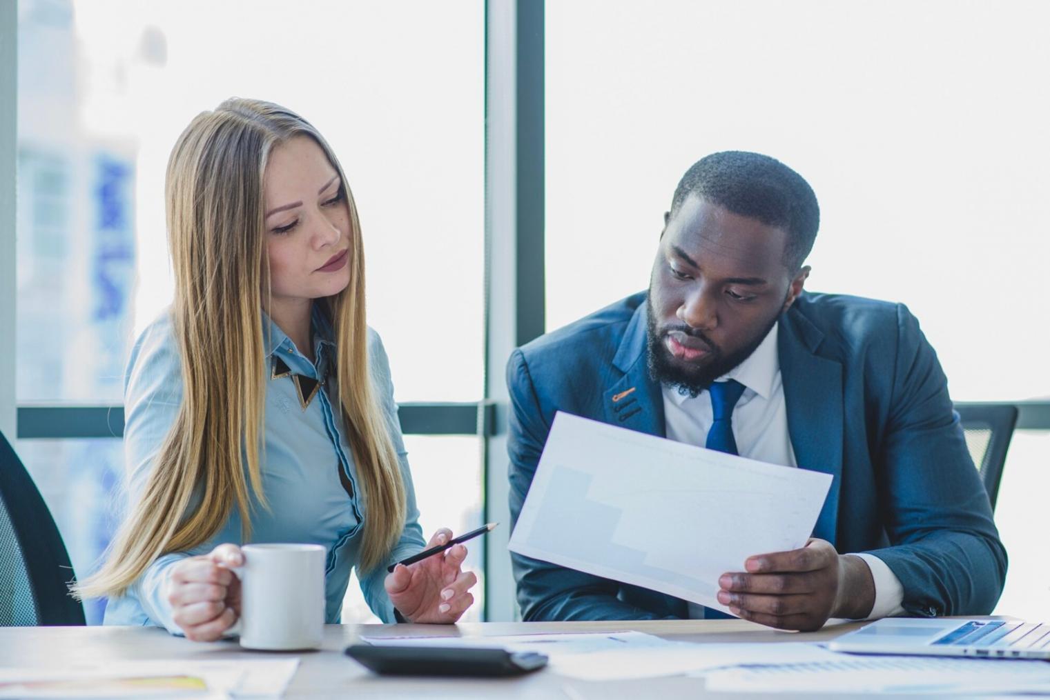Interactive financial workshop session showing practical cost management techniques